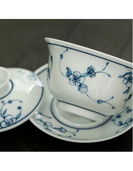 Blue and white porcelain lidded bowl with antique glaze, hand-painted ceramic, San Cai tea set, pure hand-painted plum blossom full color