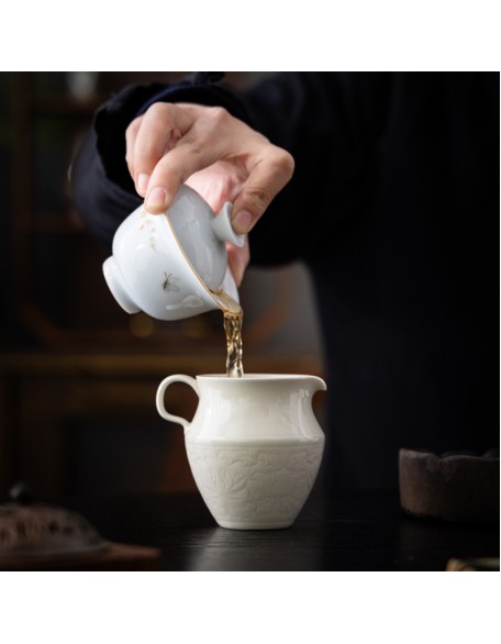 Handcrafted high-end ceramic tea infuser with engraved handle and ash decoration