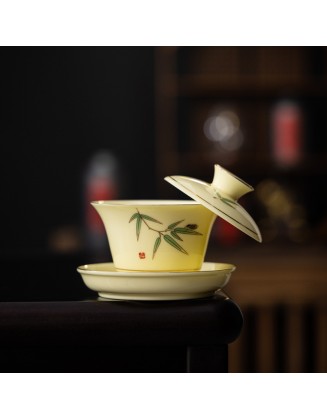 Tea set with three-legged lid that can be suspended and rotated for brewing tea without burning your hands.