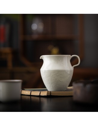 Handcrafted high-end ceramic tea infuser with engraved handle and ash decoration
