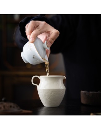 Handcrafted high-end ceramic tea infuser with engraved handle and ash decoration
